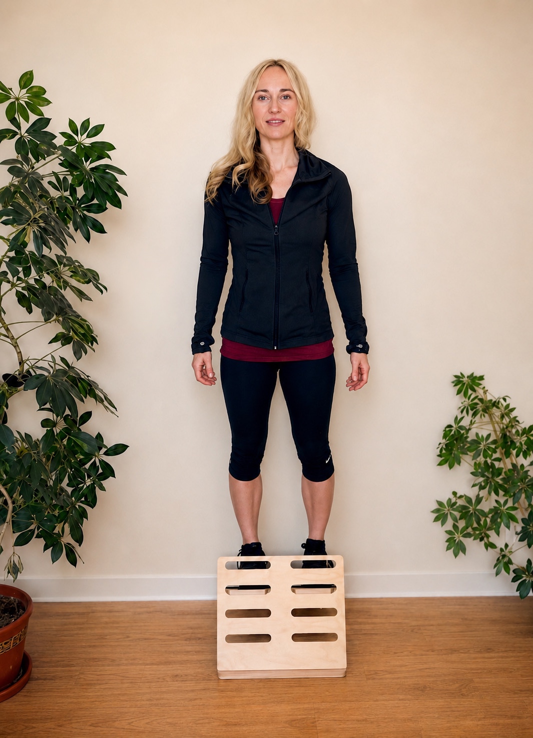 Gina demonstrating a standing platform exercise